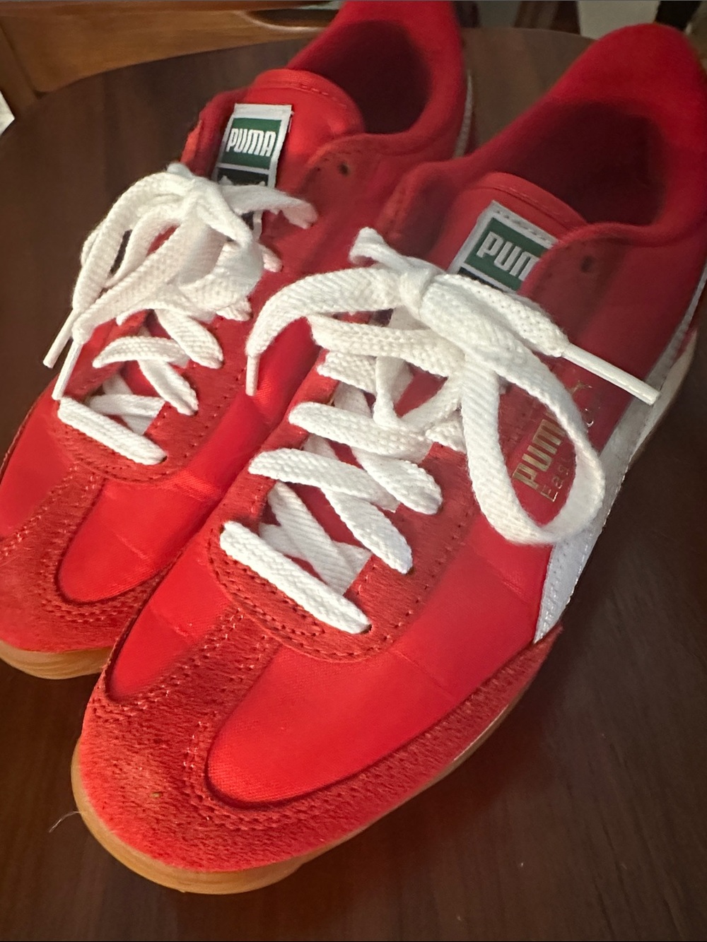 Red and white Puma sneakers. EUC. Kids 5 woman 6.5